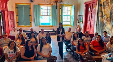 Equipe de liderança da JC Refeições durante treinamento estratégico